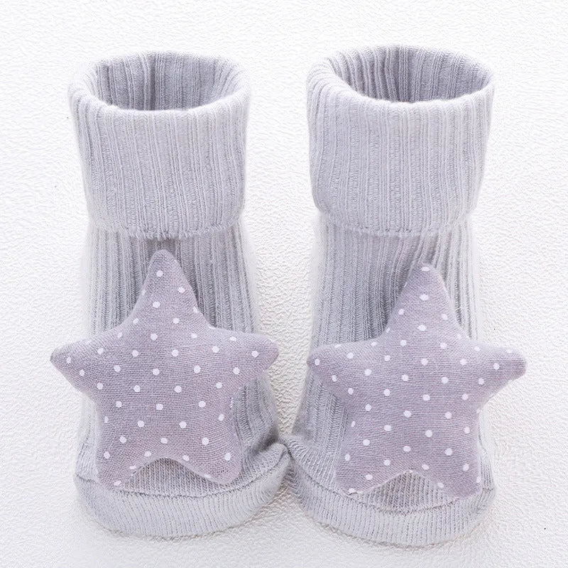 Cotton baby floor socks with anti-slip soles in animal designs for infants and toddlers