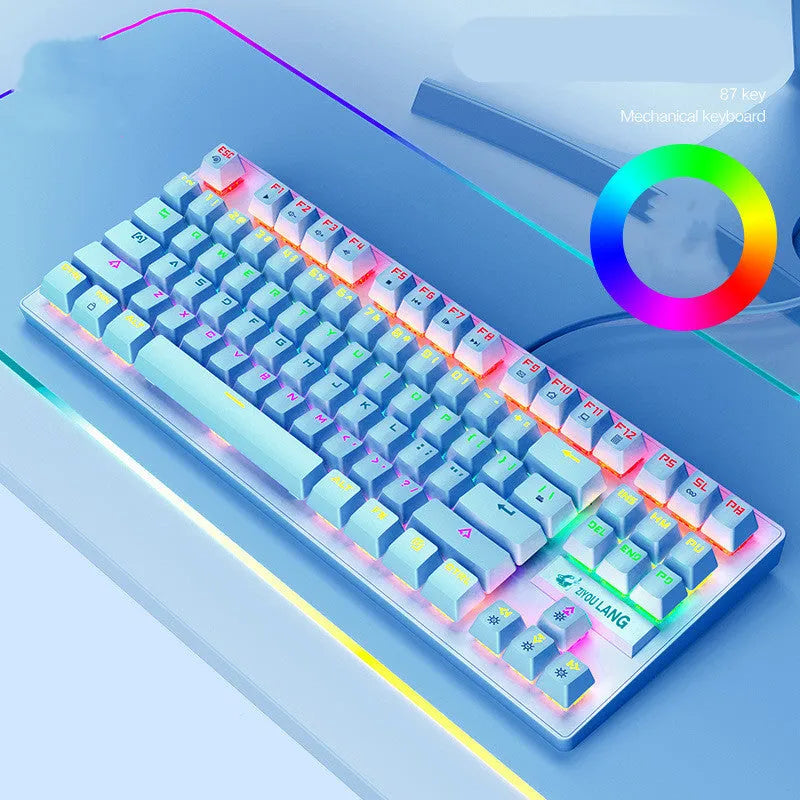 Black, white, blue, and pink coloured mechanical keyboards on a desk