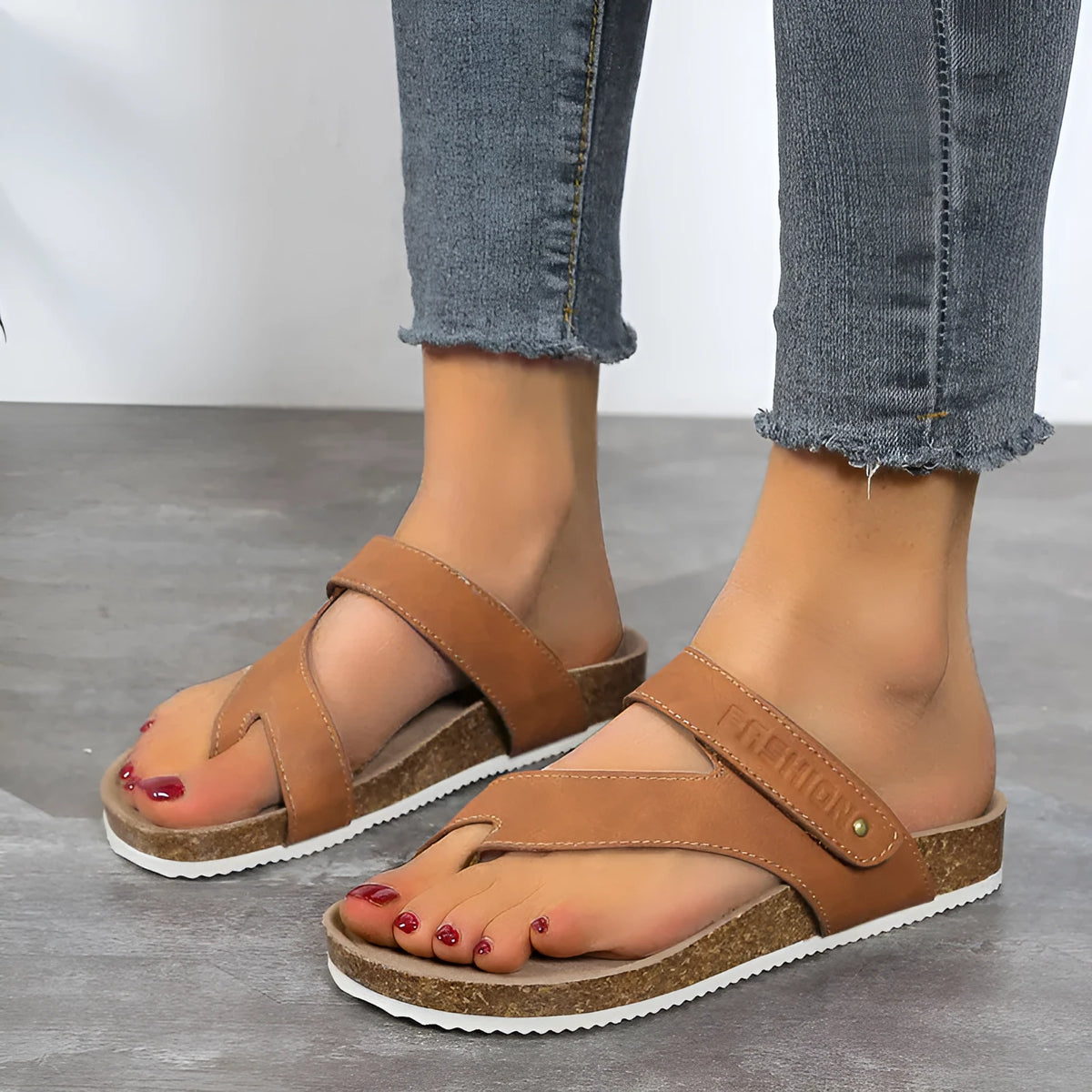 Flat thick-soled flip-flops with a toe ring strap in blue, showing artificial PU upper and foam sole.