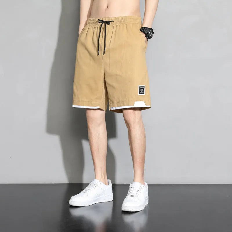 Cotton shorts for boys in plus sizes, available in black, khaki, and white.