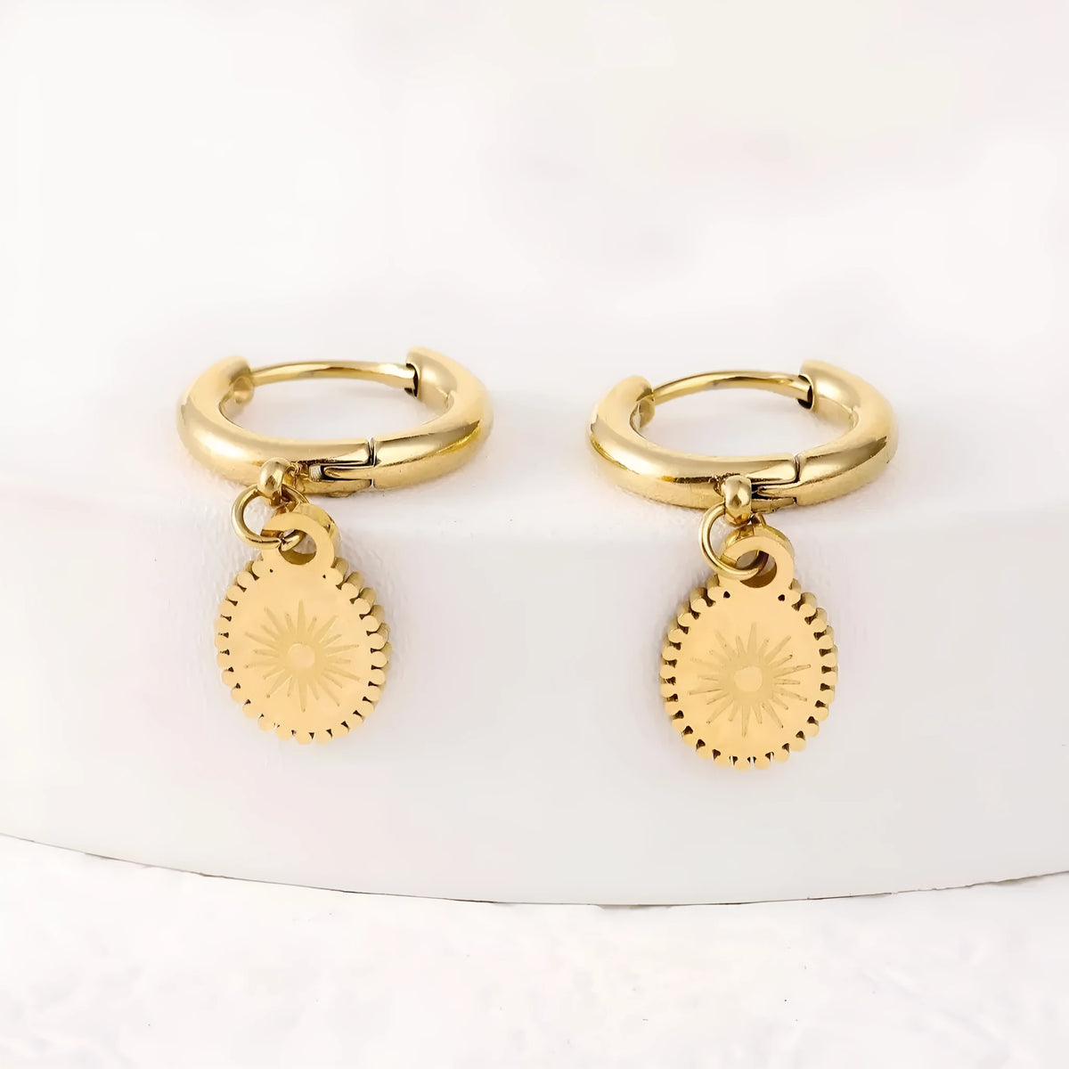 Stainless steel ellipse geometry earrings with ear button fittings in colour XY-EH005