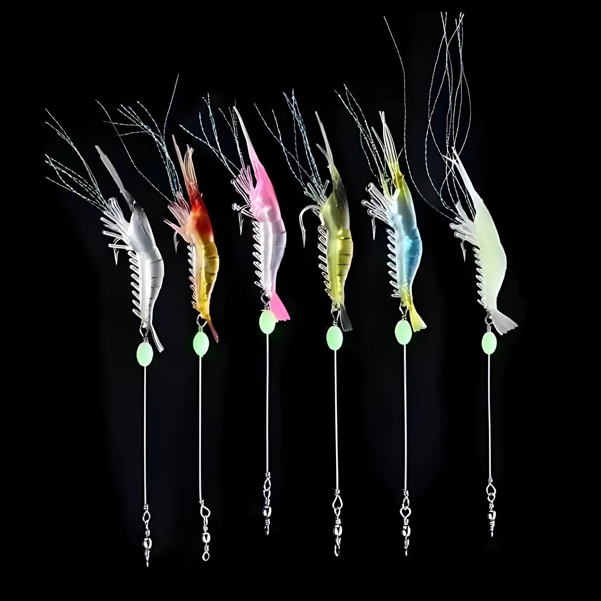 Six soft luer fishing lures with 4cm hooks in assorted colours including luminous pink and black head yellow body