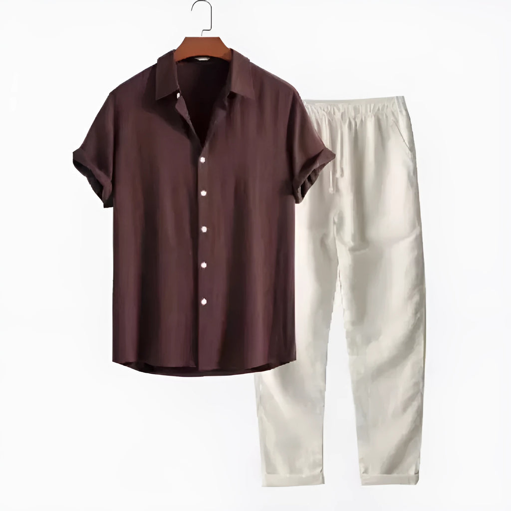 Man wearing casual loose short sleeve shirt and matching trousers in linen-style fabric