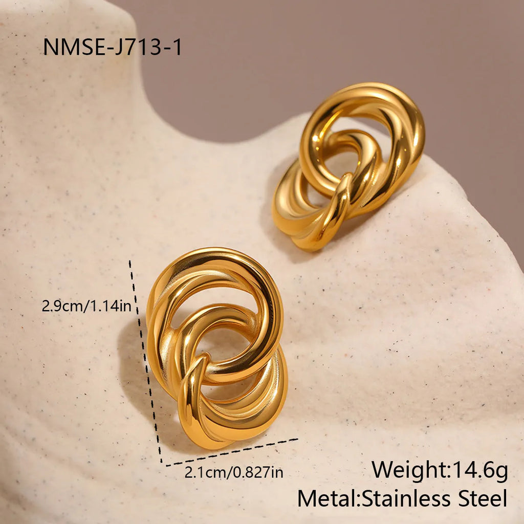 Minimalist geometric circle stud earrings in gold, stainless steel with electroplating and 18K purity