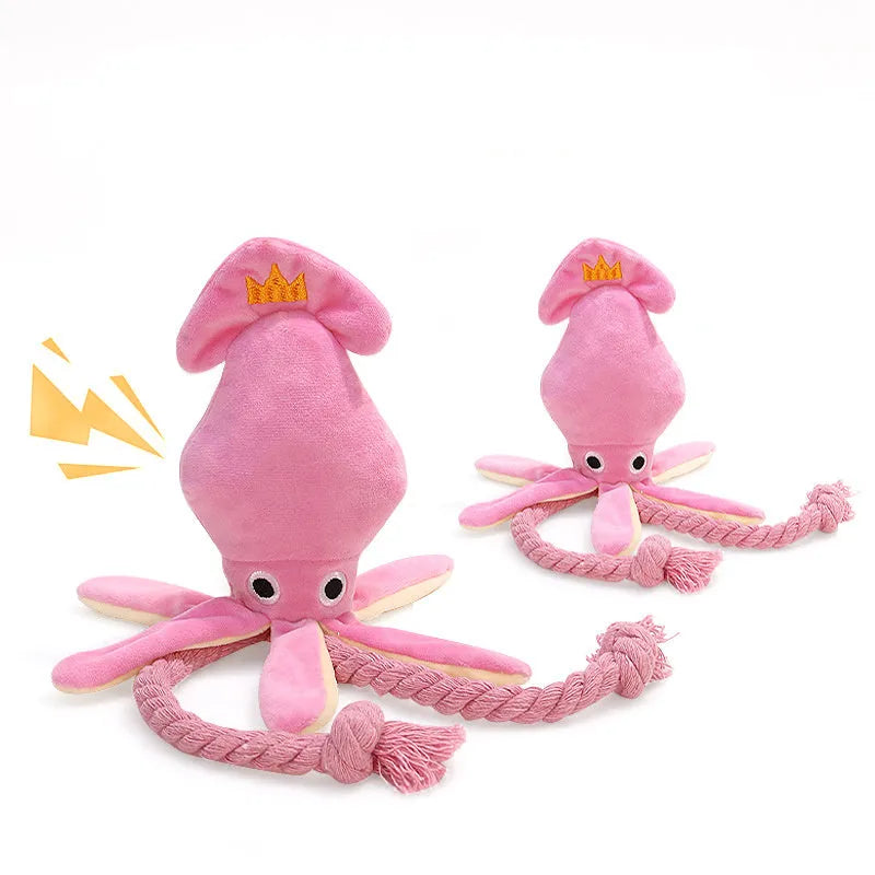 Pink plush squid pet toy with squeaker and rope tentacles