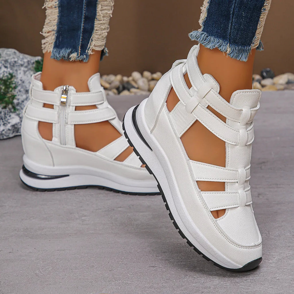 Women's black hollow-out platform sandals with a Velcro strap and round toe.