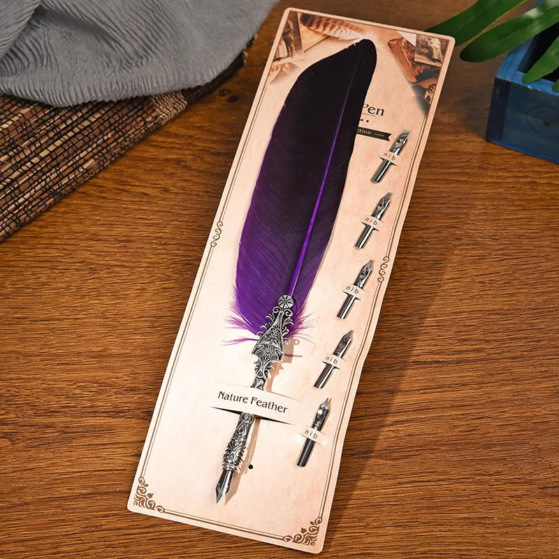Vintage feather dip pen in multiple colours with zinc alloy construction measuring 30 cm length