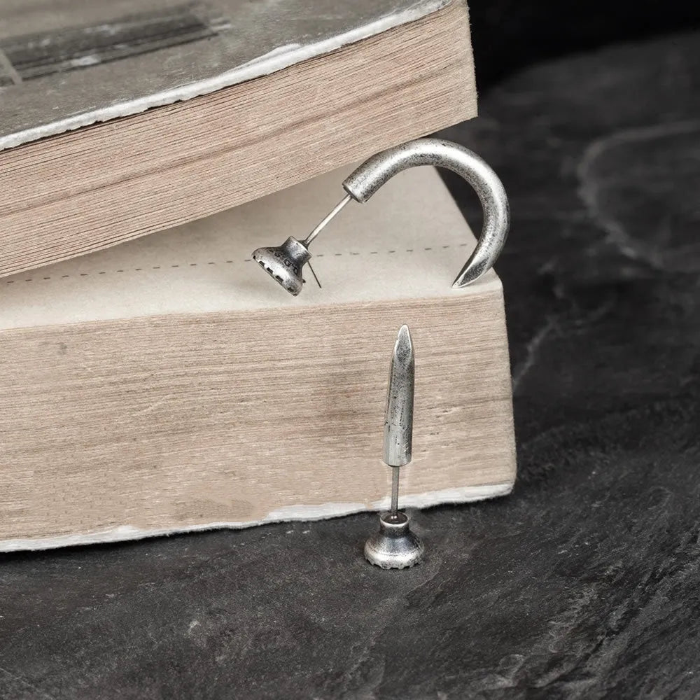 S925 sterling silver punk nail stud earring on an ear hook, showing straight and curved style options.