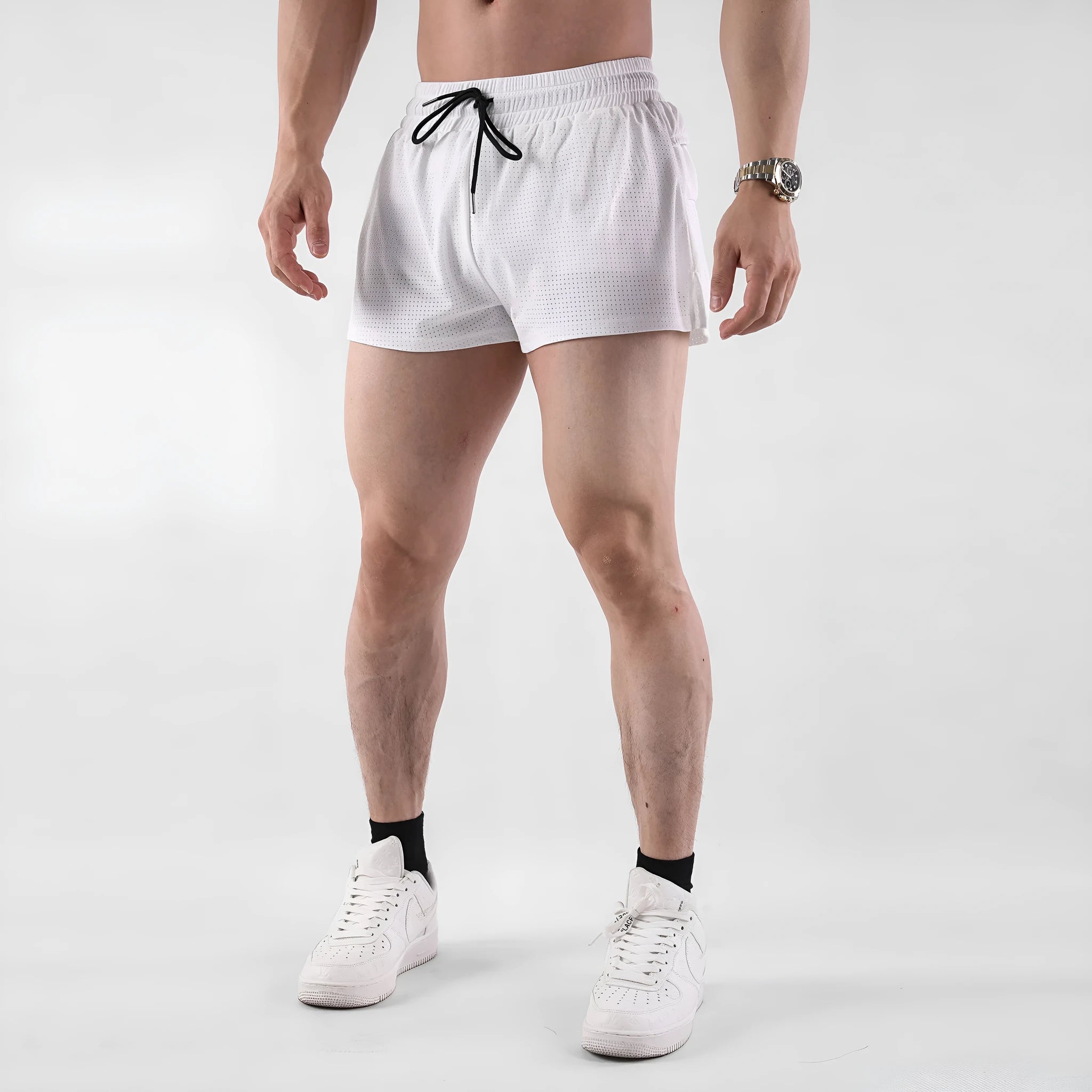 Men's black and white quick-dry nylon summer shorts with a mid waist fit.