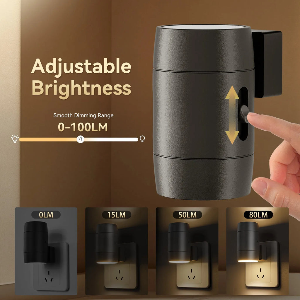 Small white plug-in night lamp with adjustable head shown in a UK wall socket