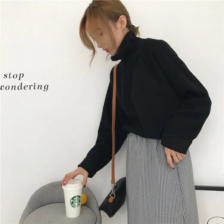 Women's loose fit long sleeve top with half-high collar in solid apricot colour