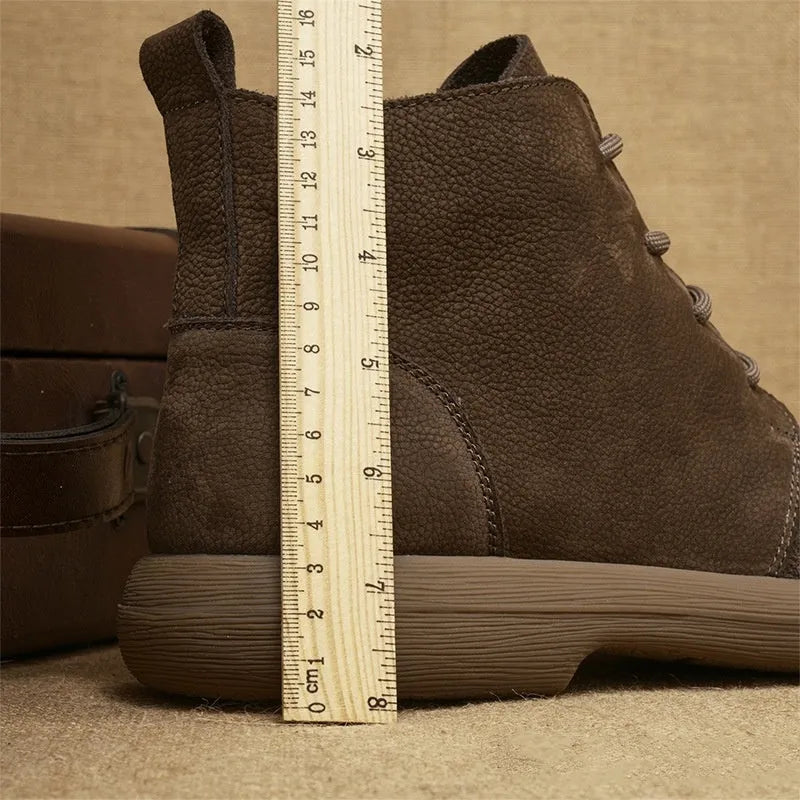 Genuine leather British-style Martin boots with wedge heel in frost-grey colour showing lace-up design and mid-calf length