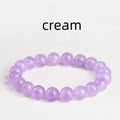 Lavender round bead amethyst bracelet with water ripple design, shown in cream and transparent colour options.