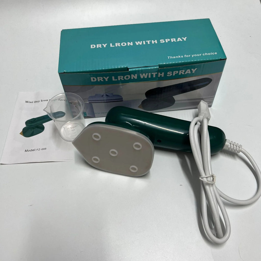 Dark green handheld garment ironing machine with titanium panel and mini steam design for travel and home use.