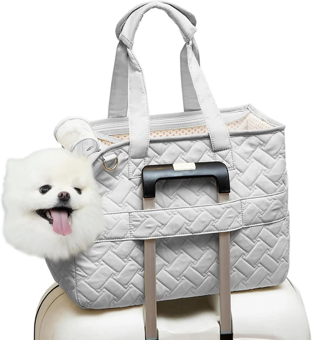Grey pet carrier handbag with mesh panels and a safety cord, shown next to a white version.