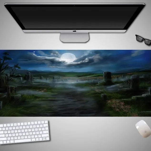 Oversized Halloween-themed gaming mouse pad on a desk, showing non-slip rubber cloth base.