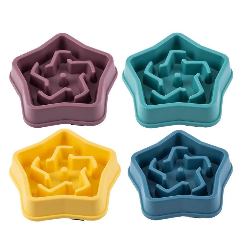 Yellow slow feeding dog bowl with rough plastic base design to prevent choking