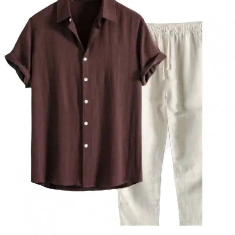 Man wearing casual loose short sleeve shirt and matching trousers in linen-style fabric
