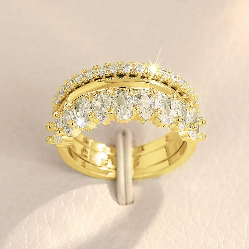 Geometric zircon three-piece ring set in white gold or yellow gold colour, sizes 6 to 10, copper band