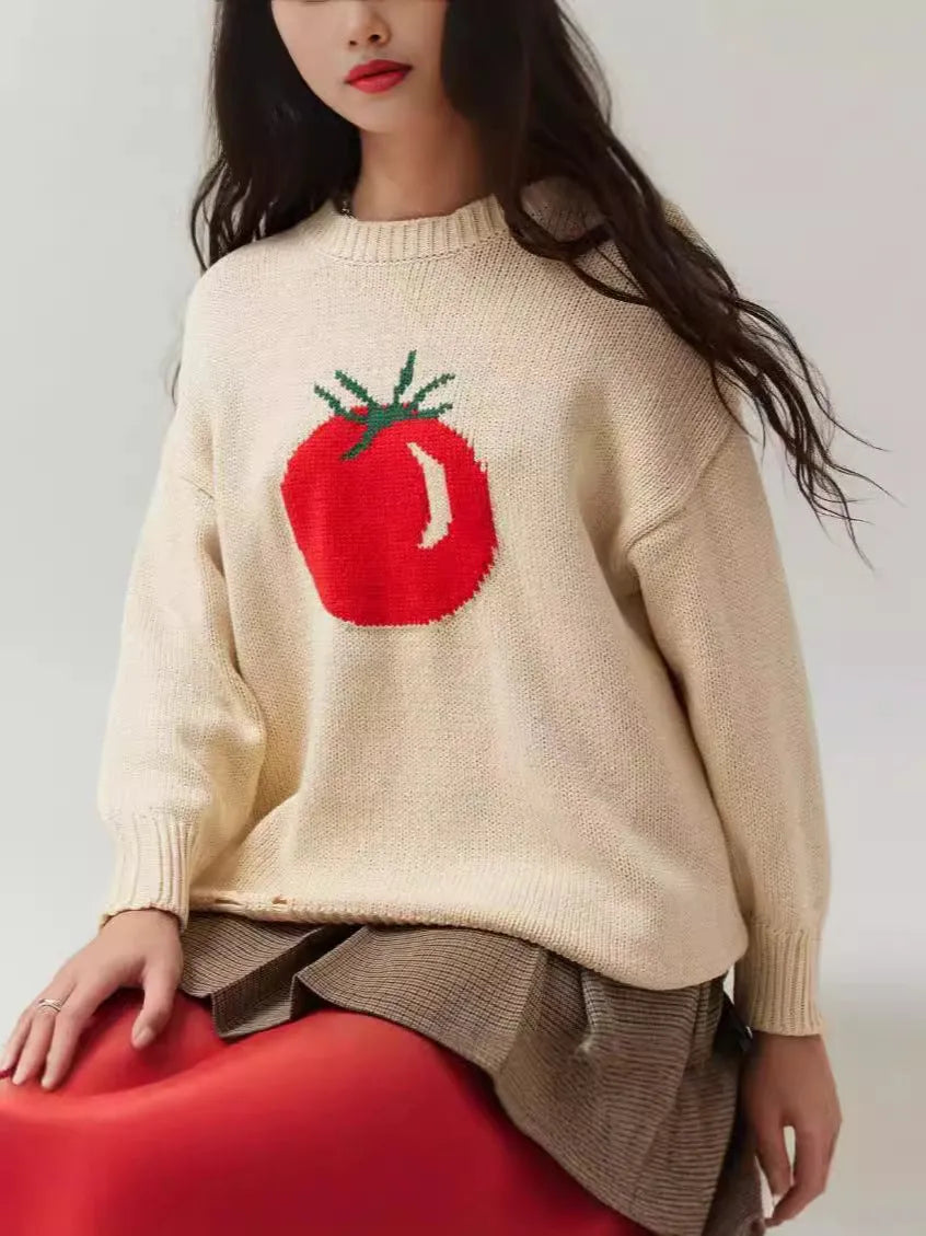 Women's milky white acrylic jacquard knit pullover sweater with round neck and long sleeves.