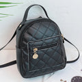Girls square hard PU backpack with embroidery detail in black, pink or white, showing soft handle and outer pocket.