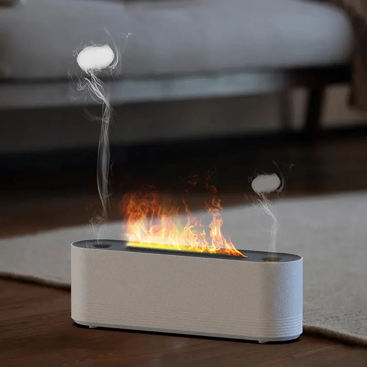 Tall black ultrasonic aroma diffuser with coloured flame LED light and rising water mist on a desk.
