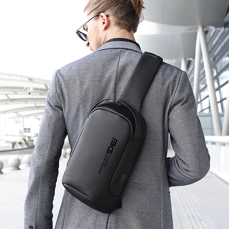 Men's black Oxford cloth shoulder bag with a USB charging port for business travel.