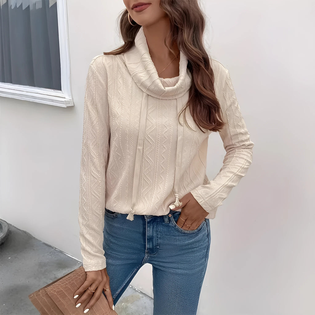 Apricot coloured hooded pullover sweater with long sleeves and drawstring hood