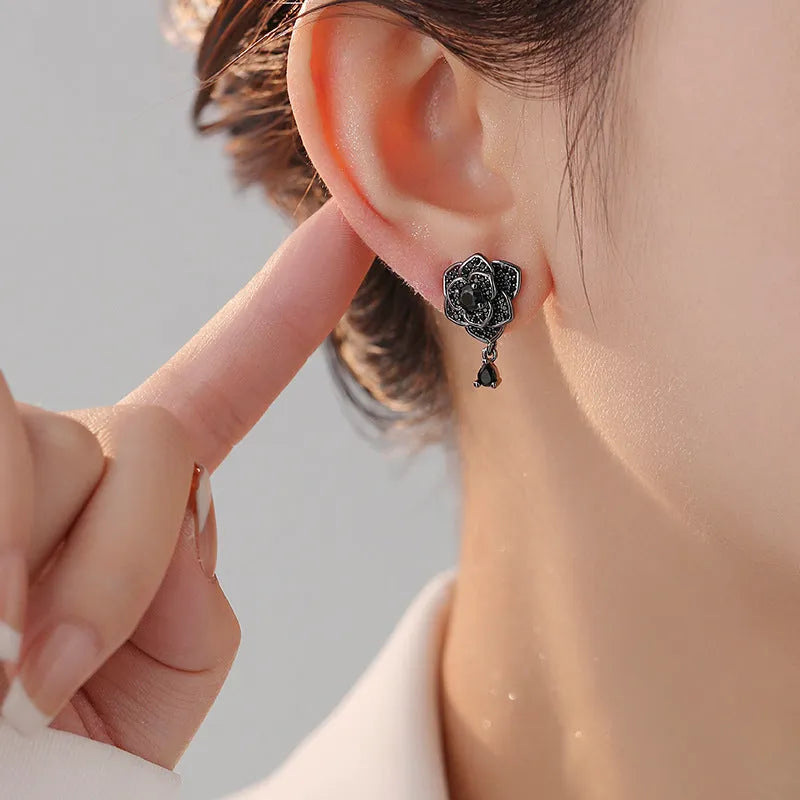 Black rose zircon stud earrings with flower shape and gold electroplated finish