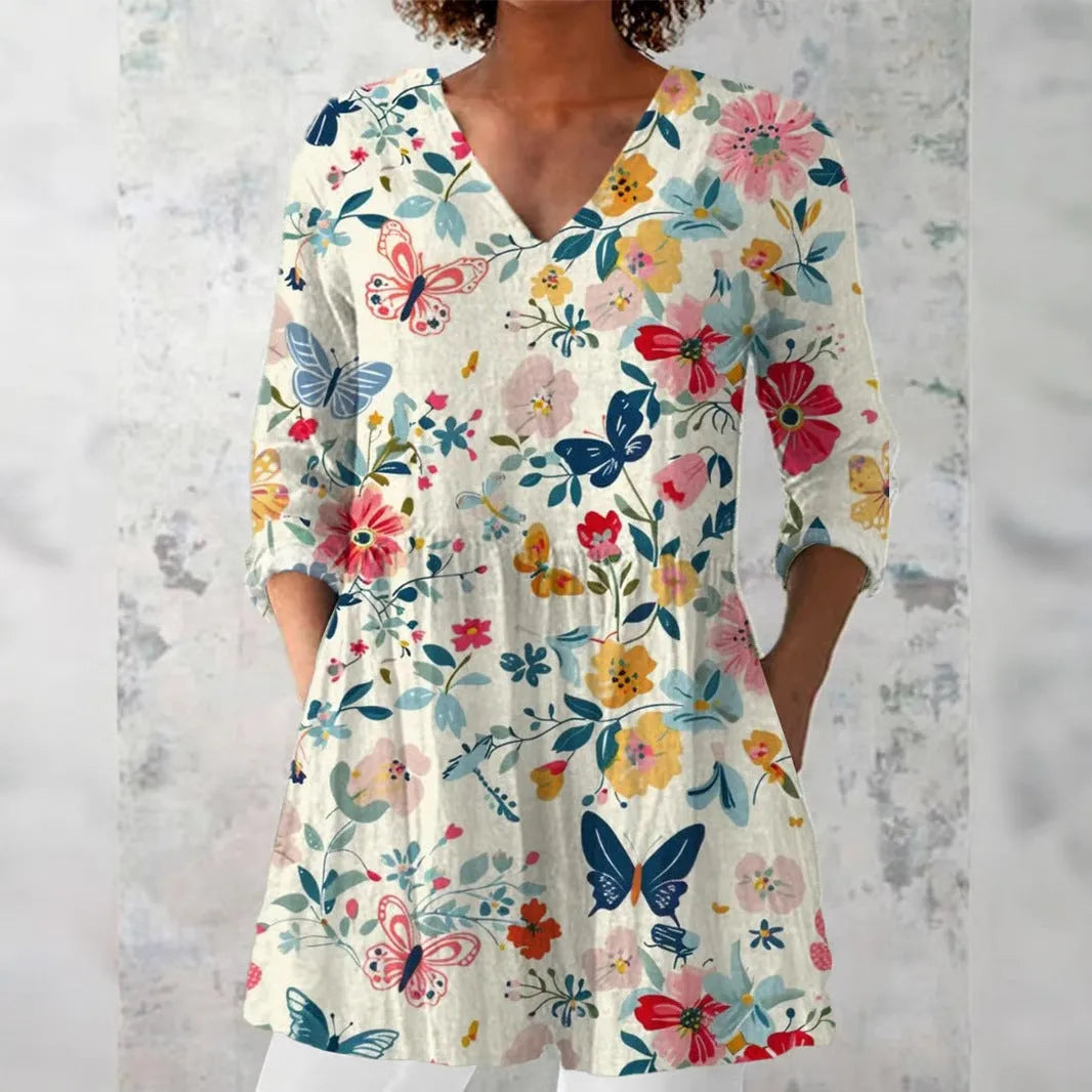 Women's retro slim fit printed long-sleeved top in a digital print design, shown on a model.