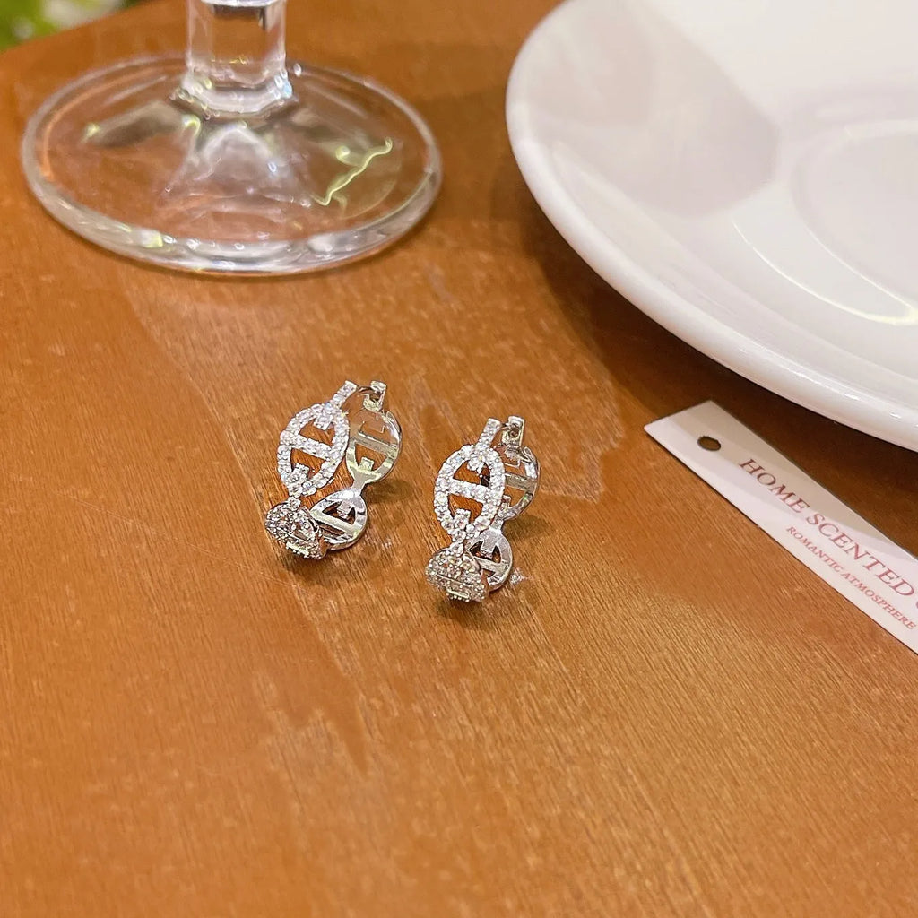 Women's casual diamond earrings in electroplated copper with thick gold plating available in silver, gold, or rose gold tones