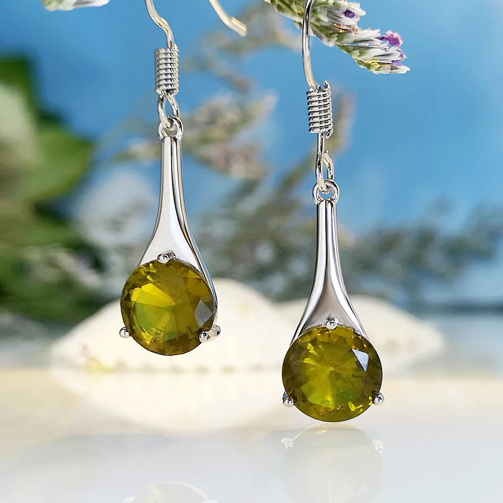 Olive green topaz drop earrings with minimalist water drop shape and retro style