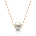 Freshwater pearl clavicle necklace with 925 sterling silver base and round geometric invisible pendant.