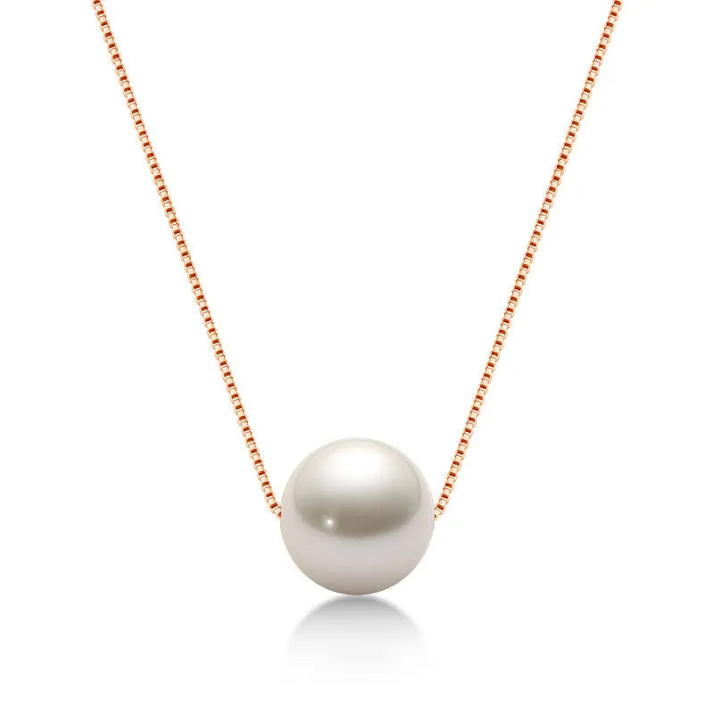 Freshwater pearl clavicle necklace with 925 sterling silver base and round geometric invisible pendant.