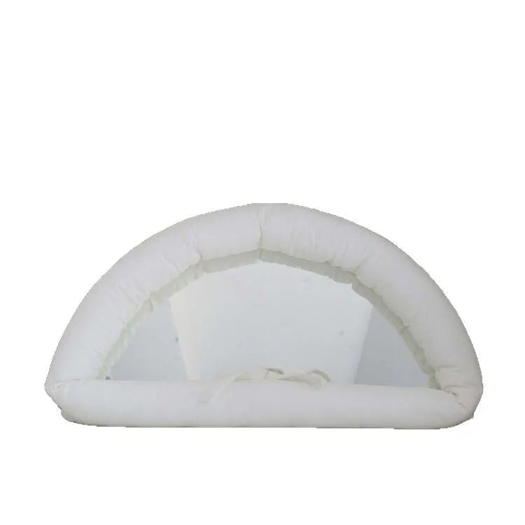 White cotton-filled PVC fabric mirror hanging on wall measuring 23x40x5cm