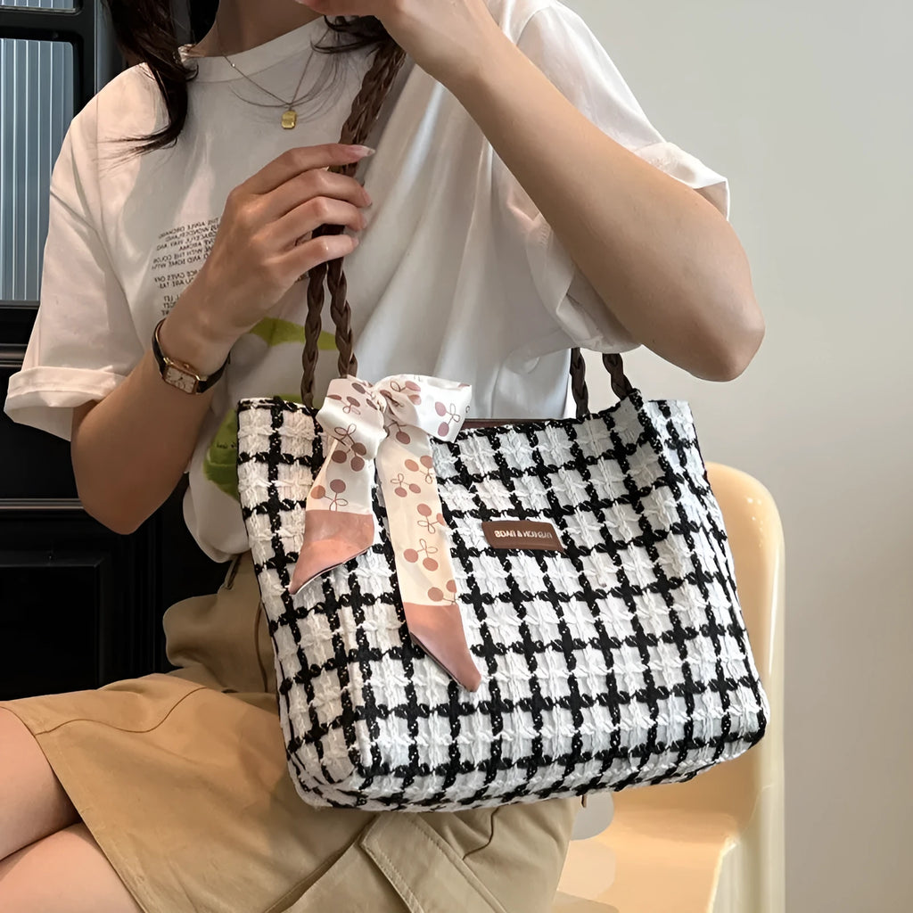 Black wool shoulder bag with horizontal square shape and internal organisation compartments