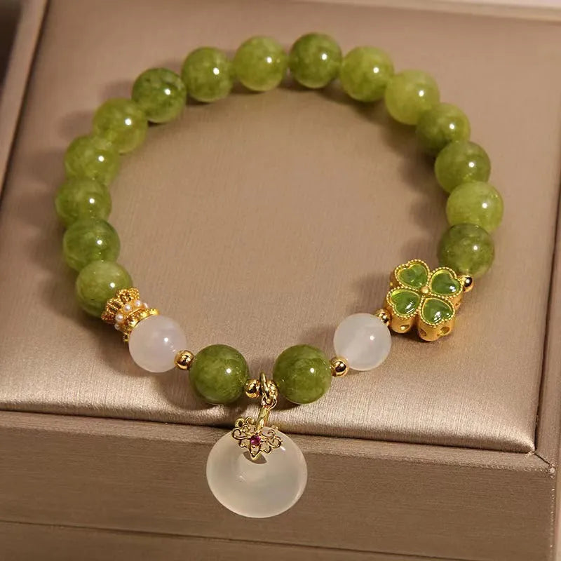 Natural green tourmaline women's bracelet with four-leaf clover design and safety buckle in New Chinese style