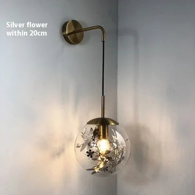 Modern glass wall lamp for bedrooms in golden flower finish with LED lighting