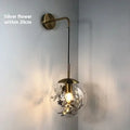 Modern glass wall lamp for bedrooms in golden flower finish with LED lighting