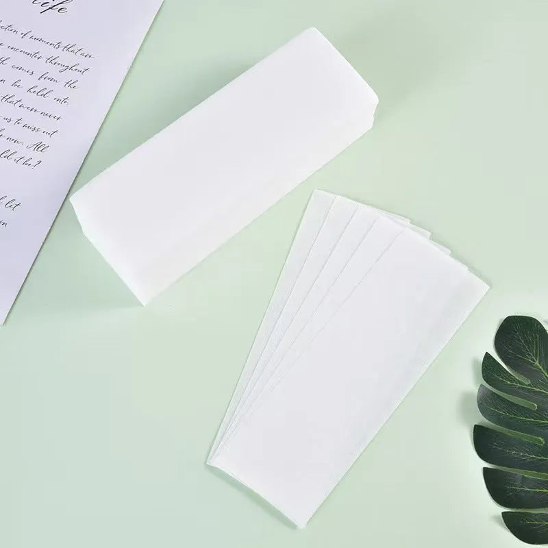 Non-woven fabric hair removal wax strips for waxing treatments