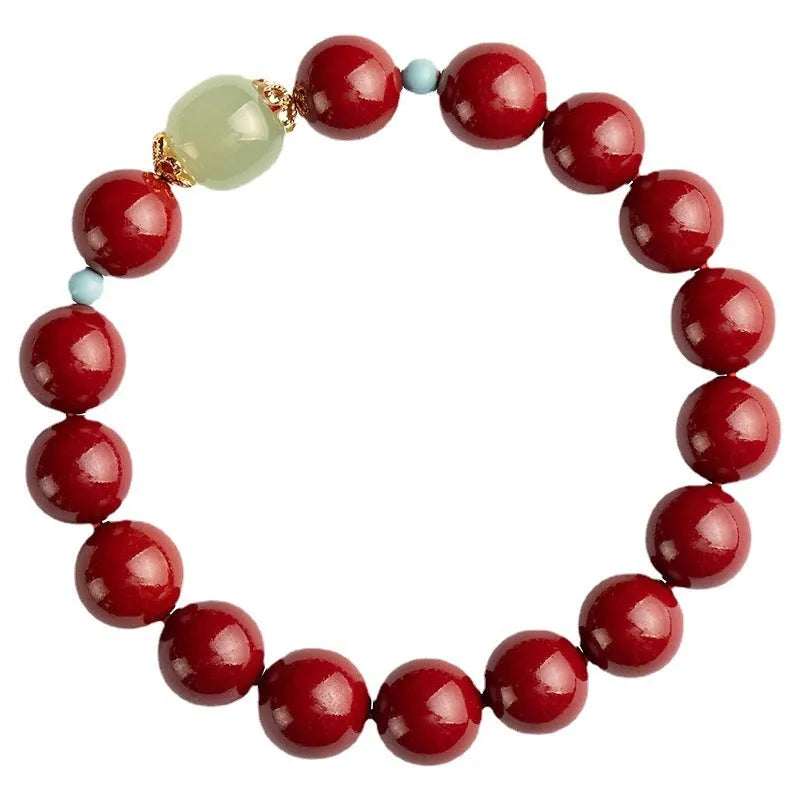 Purple gold sand cinnabar and Hetian jade beaded bracelet with geometric ellipse shapes on a wrist.