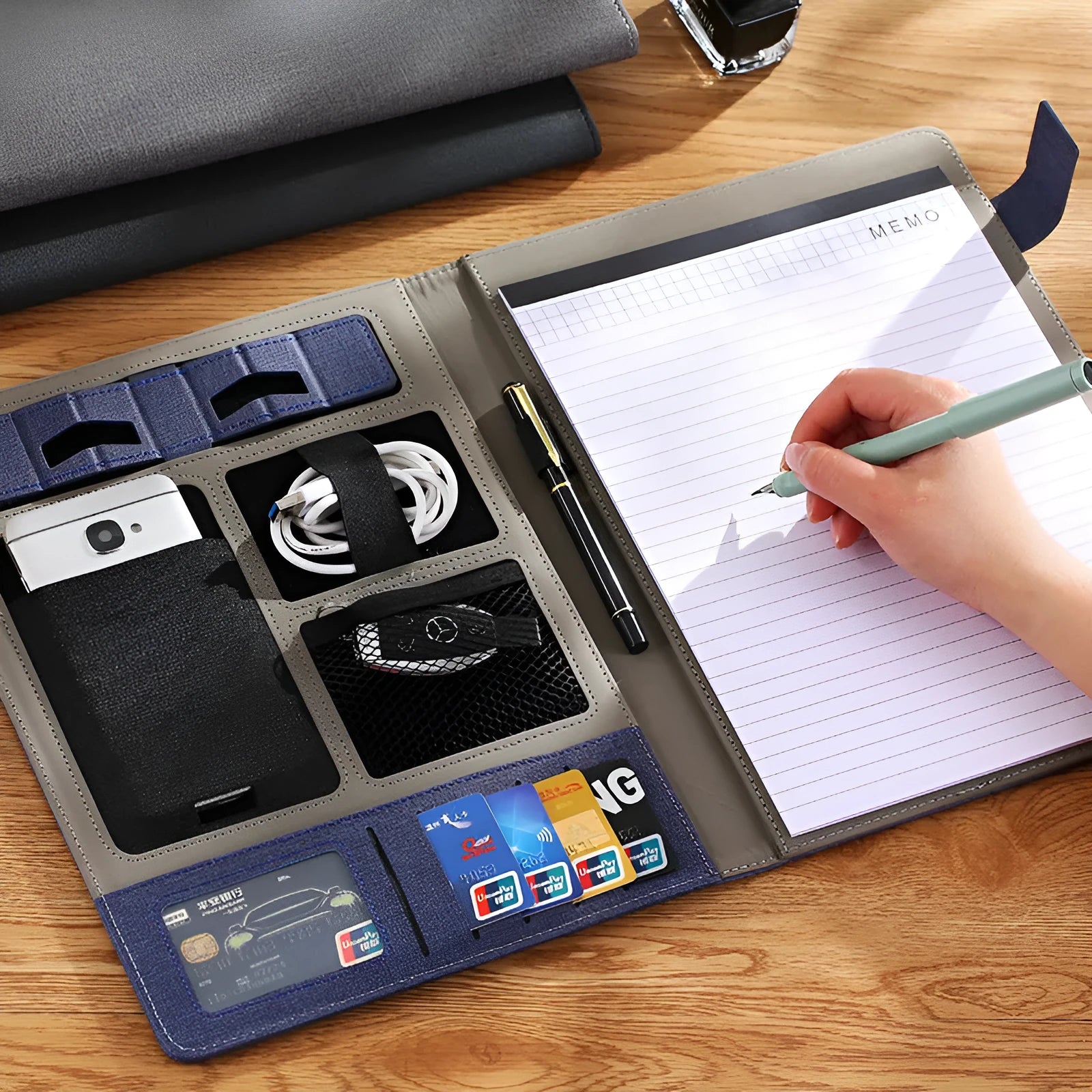 Black leather A4 business folder with pen loop and notepad, showing 35mm thickness.