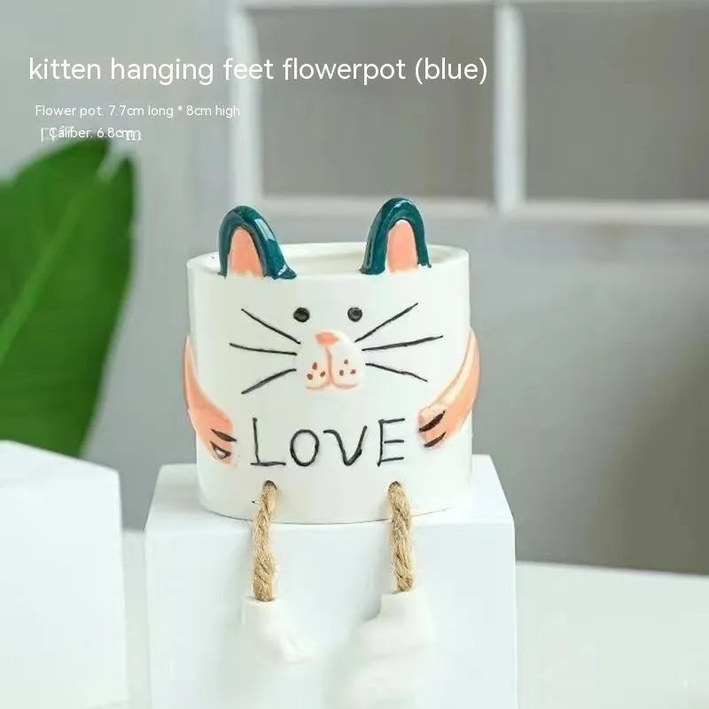 Ceramic hanging foot flowerpot in cartoon style for succulent plants on desktop