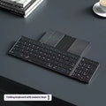 Black folding Bluetooth keyboard with touchpad for mobile phones and tablets