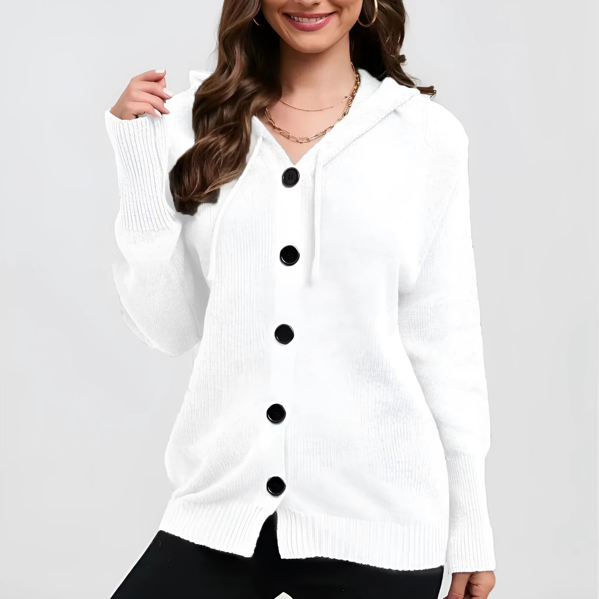 Women's solid colour hooded cardigan sweater in a loose fit, shown in one of six available colours.