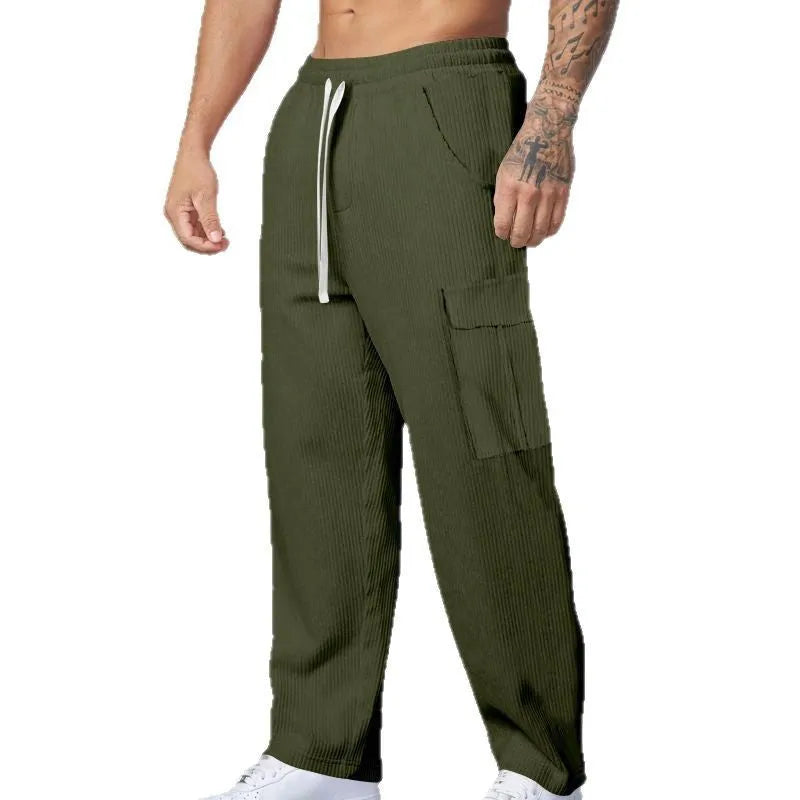Men's corduroy cargo trousers in loose-fitting wide-leg design with drawstring waist