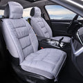 Plush winter car seat cushion shown in a grey set, with soft texture and fitting on a car seat.
