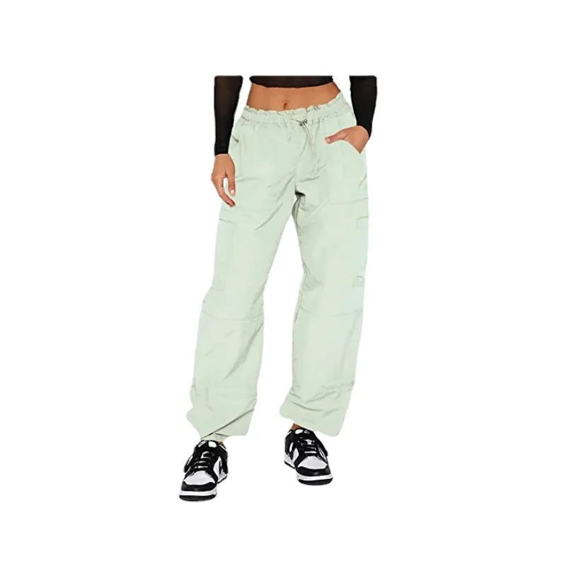 Straight leg multi-pocket cargo casual pants in polyester, shown in a neutral colour with a loose fit.