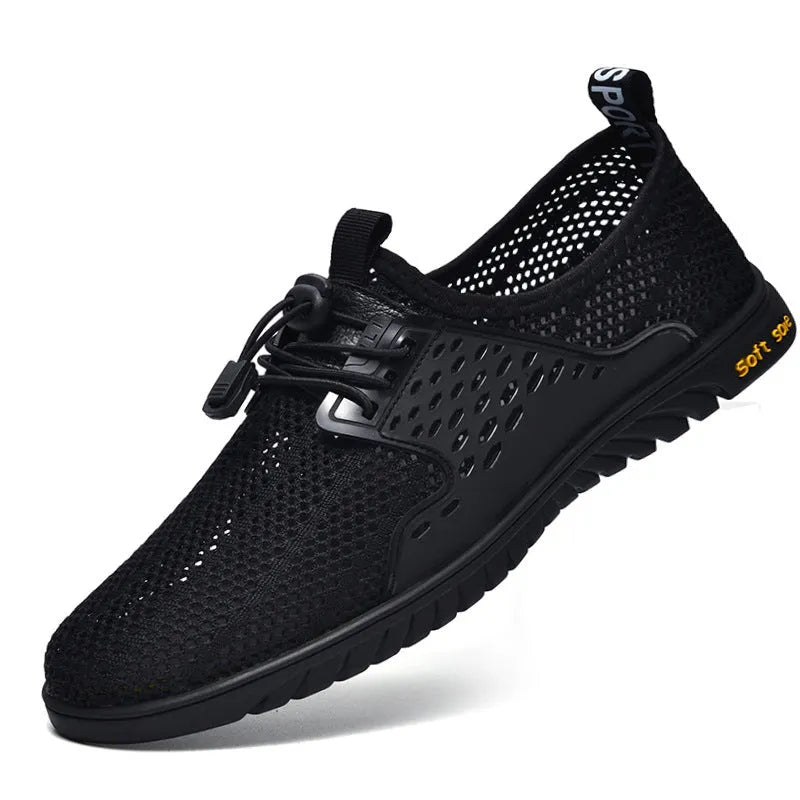 Men's casual shoes with mesh upper and elastic band in black, grey, or sand colour