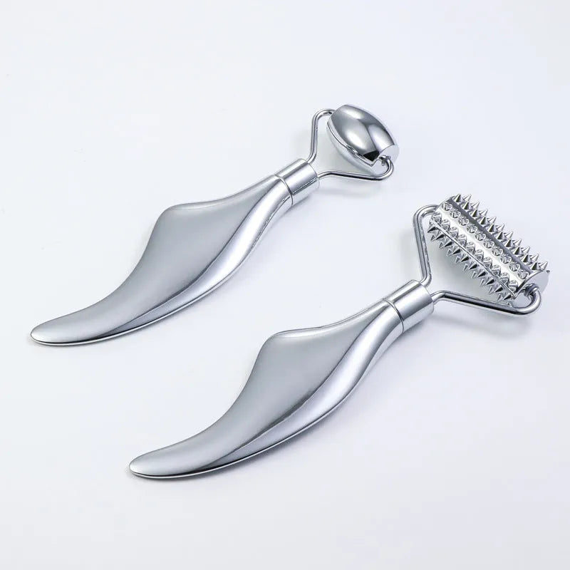 Stainless steel facial roller and scraping plate set for manual acupuncture and massage.